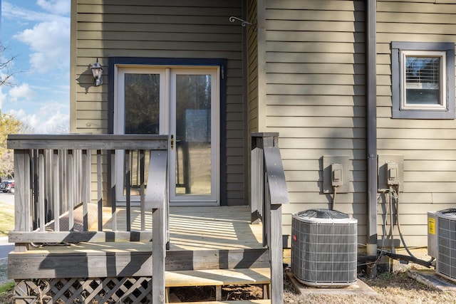 doorway to property featuring central AC