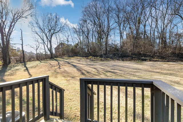 view of yard featuring cooling unit and a wooden deck