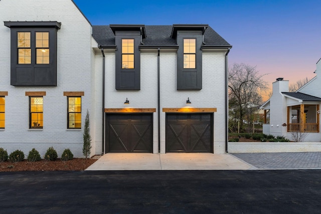 view of front of property featuring a garage