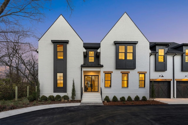 view of front of house with a garage