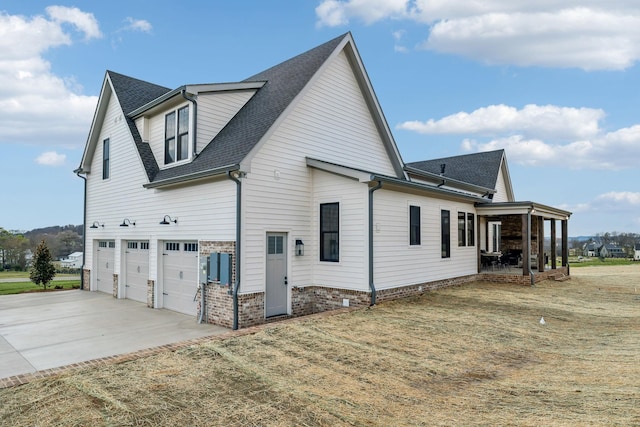 view of property exterior with a garage