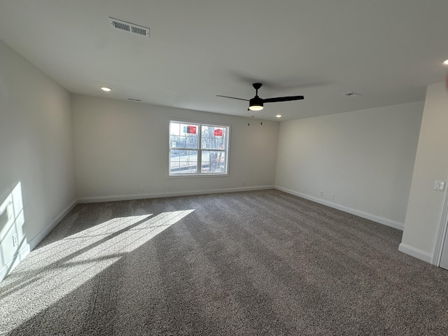 carpeted empty room with ceiling fan