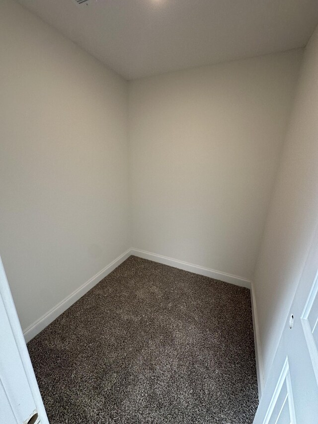 empty room with carpet floors