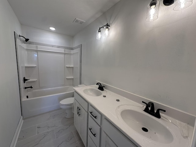 full bathroom featuring vanity, washtub / shower combination, and toilet