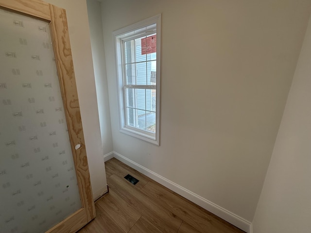 empty room featuring light hardwood / wood-style floors