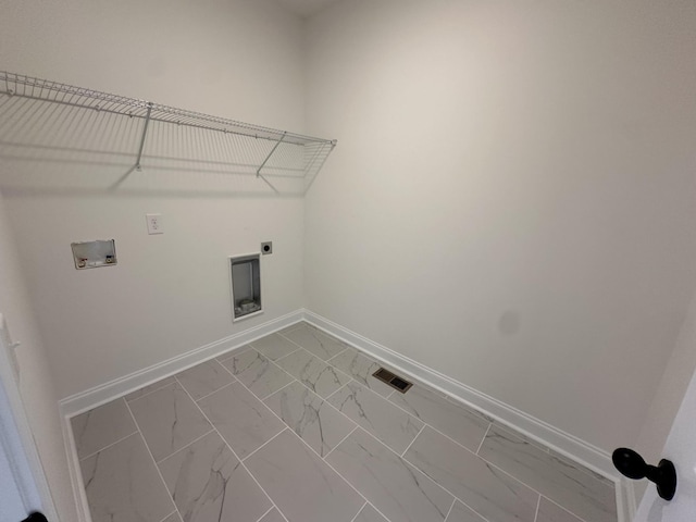 laundry room with baseboards, marble finish floor, visible vents, electric dryer hookup, and laundry area