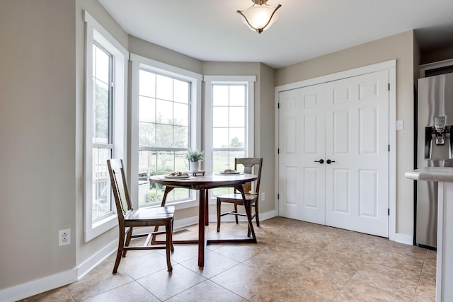 view of tiled dining space