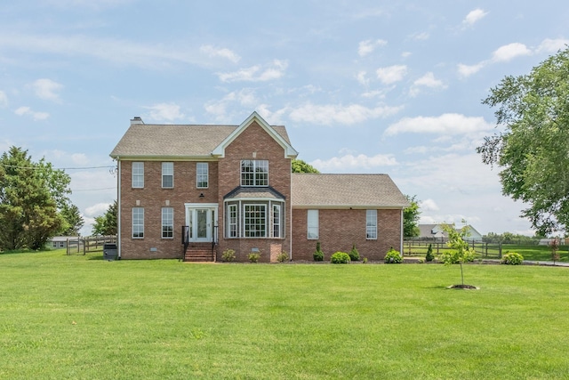 view of front facade featuring a front lawn