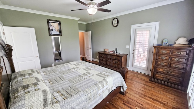 bedroom with ceiling fan, access to exterior, dark wood-type flooring, and crown molding