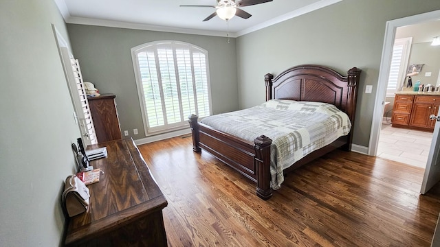 bedroom featuring ceiling fan, crown molding, and dark hardwood / wood-style floors