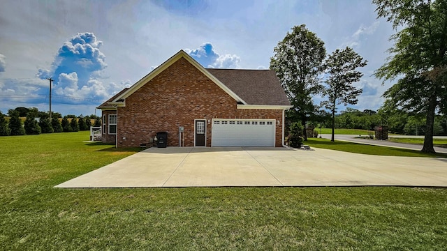 view of property exterior featuring a lawn and a garage