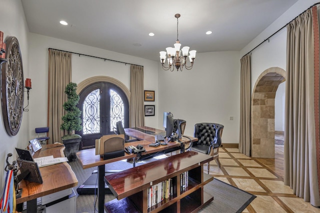 dining room featuring arched walkways, baseboards, french doors, a chandelier, and recessed lighting