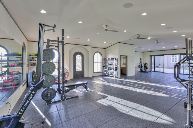 exercise room featuring tile flooring, plenty of natural light, and ceiling fan