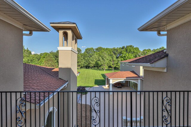 view of terrace with a balcony