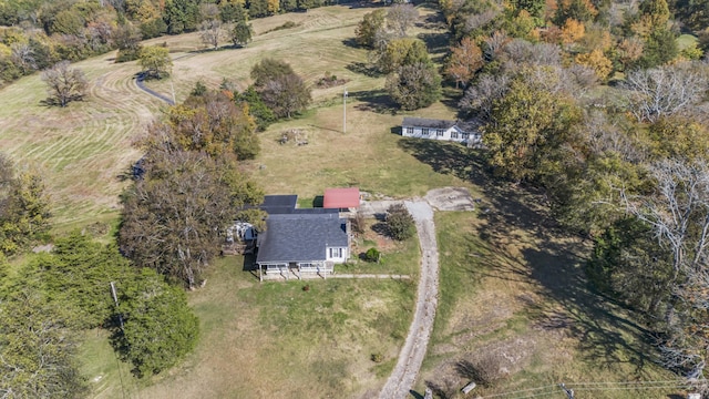 birds eye view of property featuring a rural view