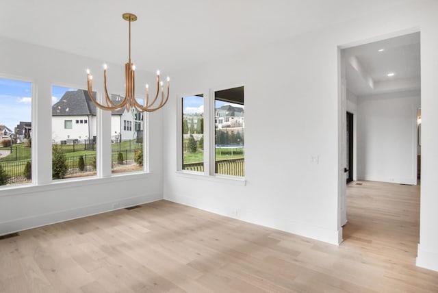 6051 Lookaway Cir, Franklin, TN 37067 - unfurnished dining area featuring a chandelier, wood finished floors, and recessed lighting