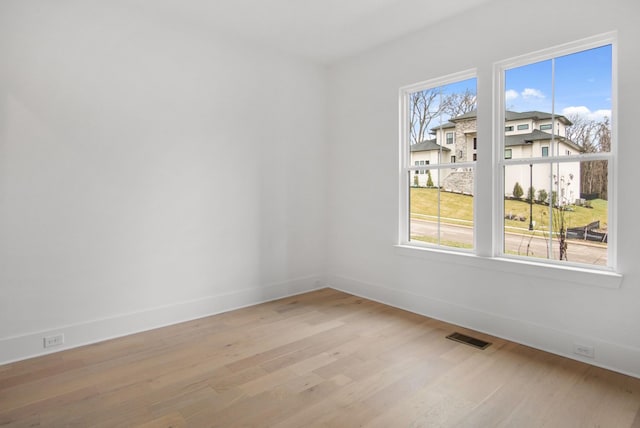 6051 Lookaway Cir, Franklin, TN 37067 - spare room featuring baseboards and light wood-type flooring