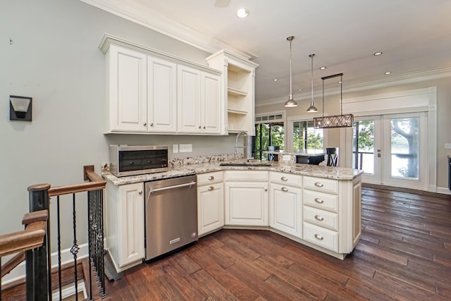 kitchen featuring french doors, white cabinets, sink, stainless steel dishwasher, and kitchen peninsula