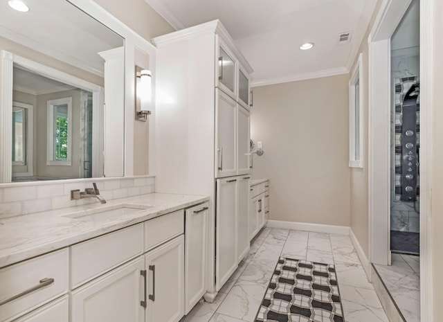 bathroom with decorative backsplash, vanity, and crown molding