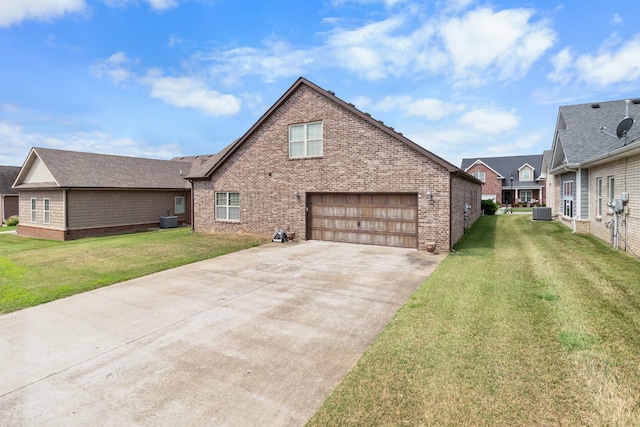 view of front of property with a garage and a front yard