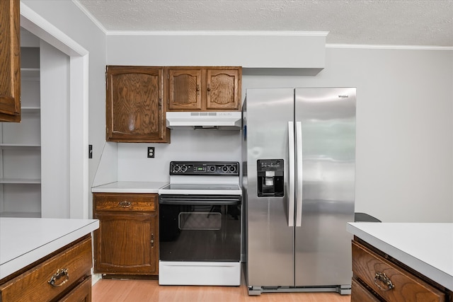 kitchen featuring light hardwood / wood-style floors, a textured ceiling, stainless steel fridge, and white electric range oven