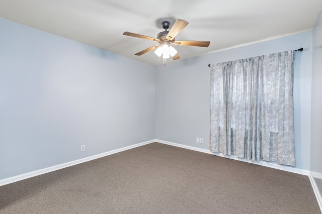 carpeted empty room featuring ceiling fan