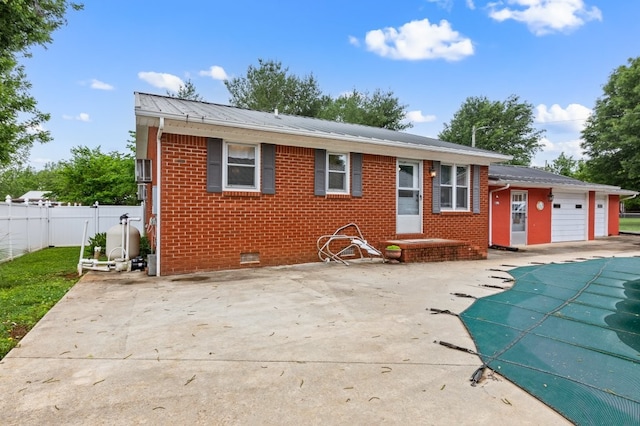 rear view of property with a patio area