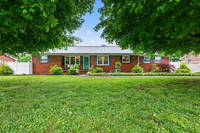 ranch-style house with a front yard