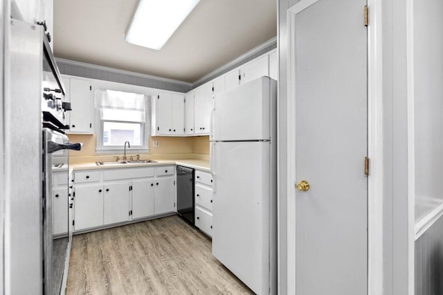 kitchen featuring sink, crown molding, black dishwasher, white cabinets, and white fridge