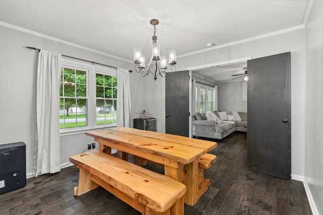 dining space with crown molding, dark hardwood / wood-style floors, and ceiling fan with notable chandelier