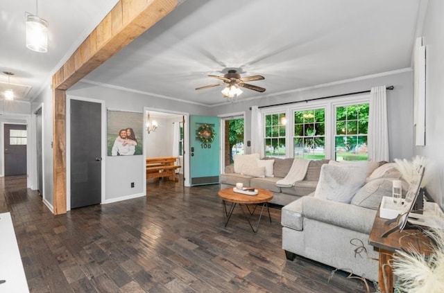 living room with dark hardwood / wood-style flooring, ornamental molding, and ceiling fan