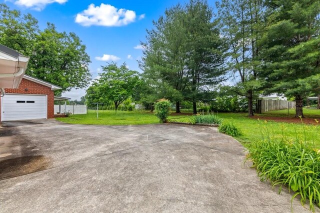 view of yard with a garage