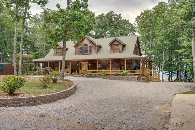 log home with covered porch