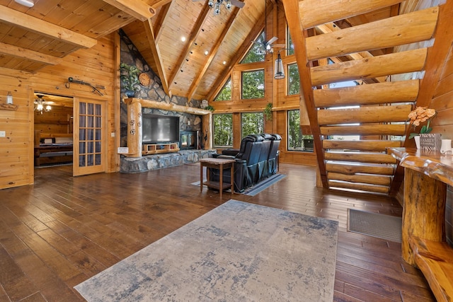 unfurnished living room featuring wood ceiling, high vaulted ceiling, beam ceiling, and dark hardwood / wood-style flooring