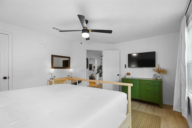 bedroom featuring ceiling fan and light wood-type flooring