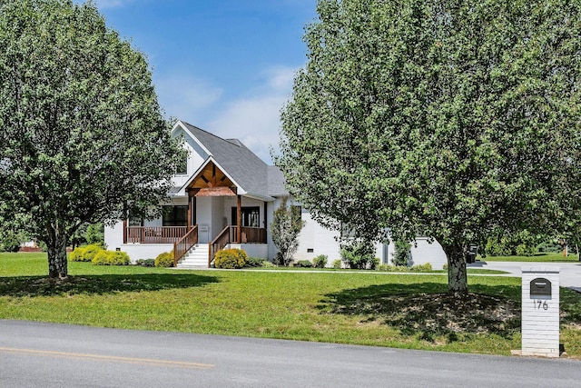 view of front facade with a porch and a front yard