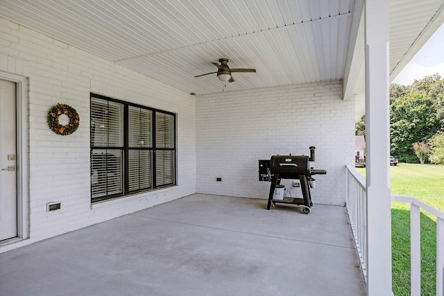 view of patio featuring ceiling fan and a grill