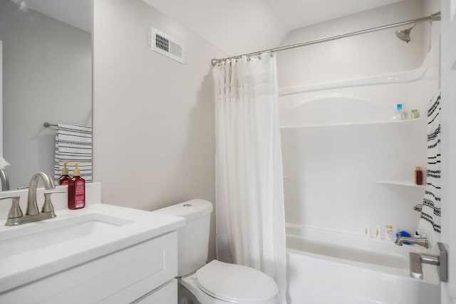 full bathroom with vanity, toilet, and shower / bath combo