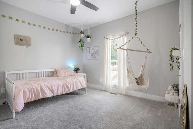 carpeted bedroom with ceiling fan