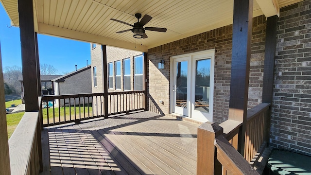 wooden terrace with ceiling fan