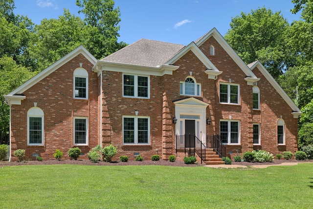 view of front of property with a front lawn