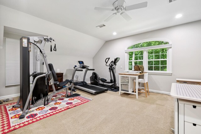 workout room featuring ceiling fan, light carpet, and lofted ceiling