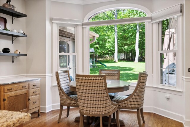 dining area with hardwood / wood-style floors