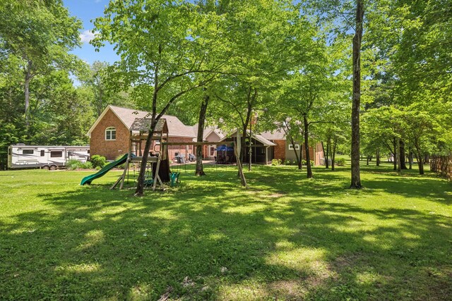 view of yard with a playground