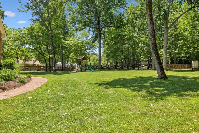 view of yard with a playground