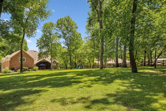 view of yard featuring a playground