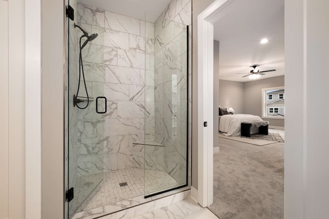 bathroom featuring walk in shower and ceiling fan