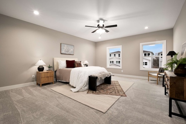 carpeted bedroom with ceiling fan