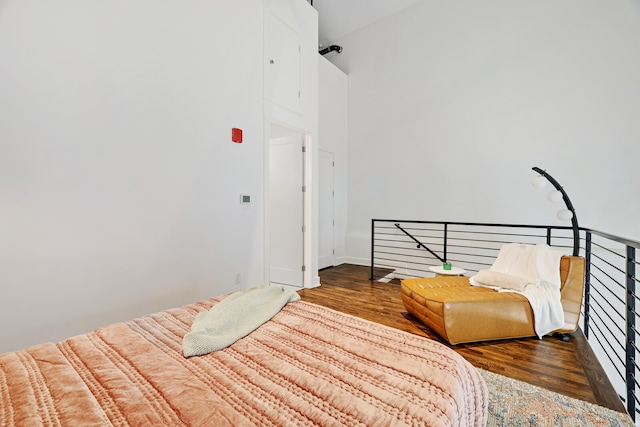 bedroom featuring dark hardwood / wood-style floors