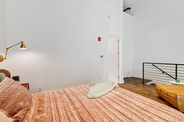 unfurnished bedroom with hardwood / wood-style flooring